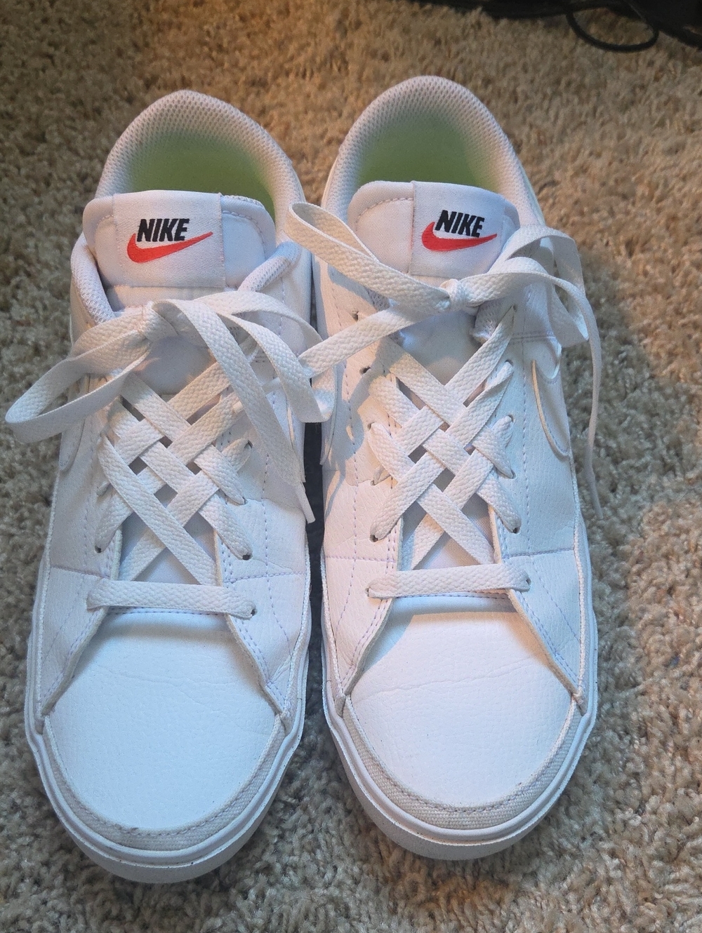 Nike Womens White Sneakers with Red Swoosh. Court Legacy